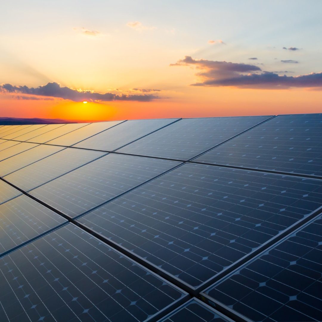 Sunset,Rays,Over,A,Photovoltaic,Power,Plant